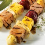 Orange-glazed ham and fruit brochettes