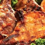 Grilled pork chops with apricot mustard glaze