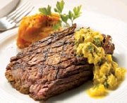 Marinated flank steaks with light turmeric and pineapple sauce