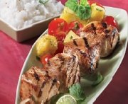 Turkey brochette with pineapple and cherry tomato salad