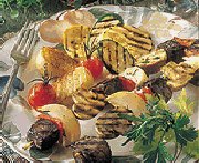 Brochettes de filet de porc au citron et au gingembre, sauce à la mangue