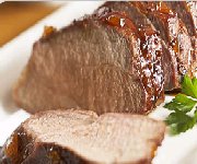 Filet de porc r&ocirc;ti avec un gla&ccedil;age &agrave; la moutarde et &agrave; l'abricot