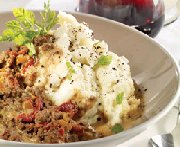 Parmentier au boeuf haché, aux champignons et aux tomates séchées