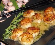 Seared scallops with tarragon- butter sauce 