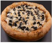 Pizza au poulet, au fromage de chèvre et tomates séchées